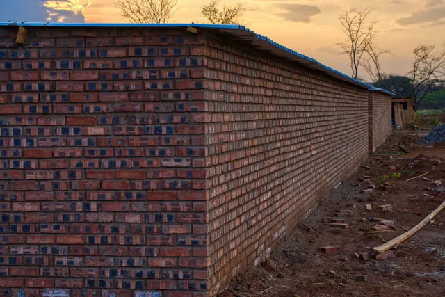 Newly laid brickwork for the piggery housing
