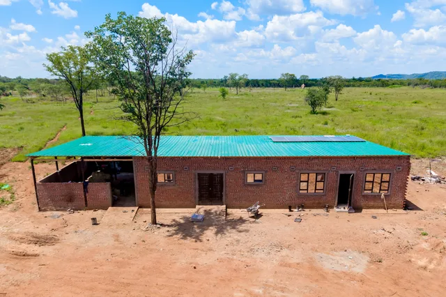 A completed farm building with new roofing