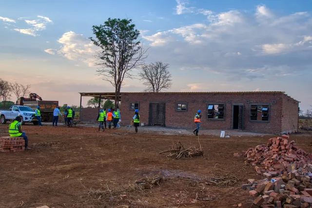 Crew finishing the long farm block